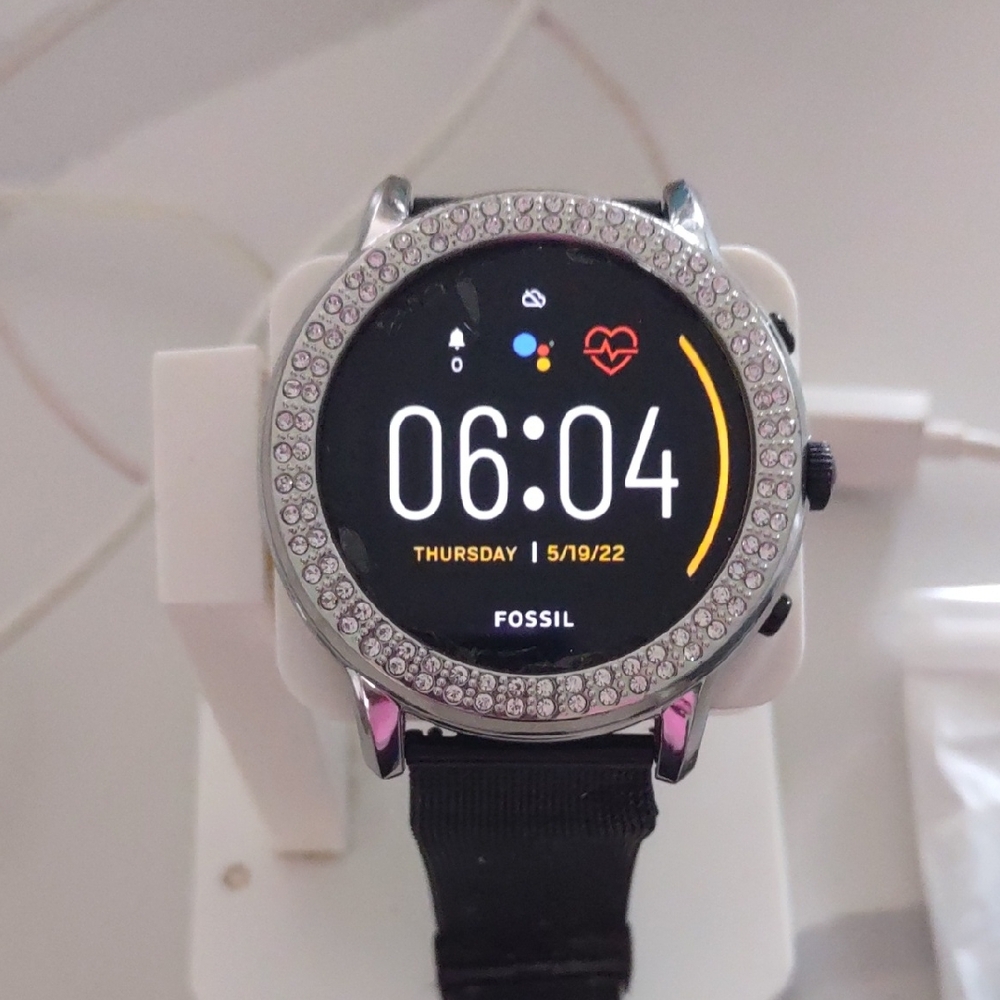 Fossil Android Smartwatch. 4 Years old  works great. Needs new glass cover.